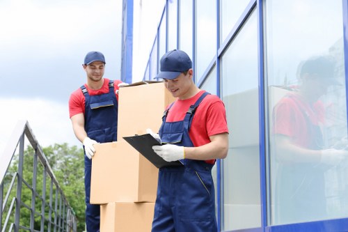 Staff using protective equipment during storage operations