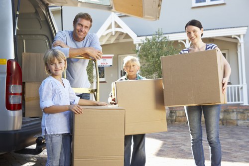 Storage team collecting packed items from a Roehampton property