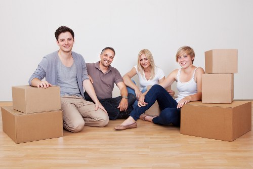 Moving team handling a flat move with stairs and tight access